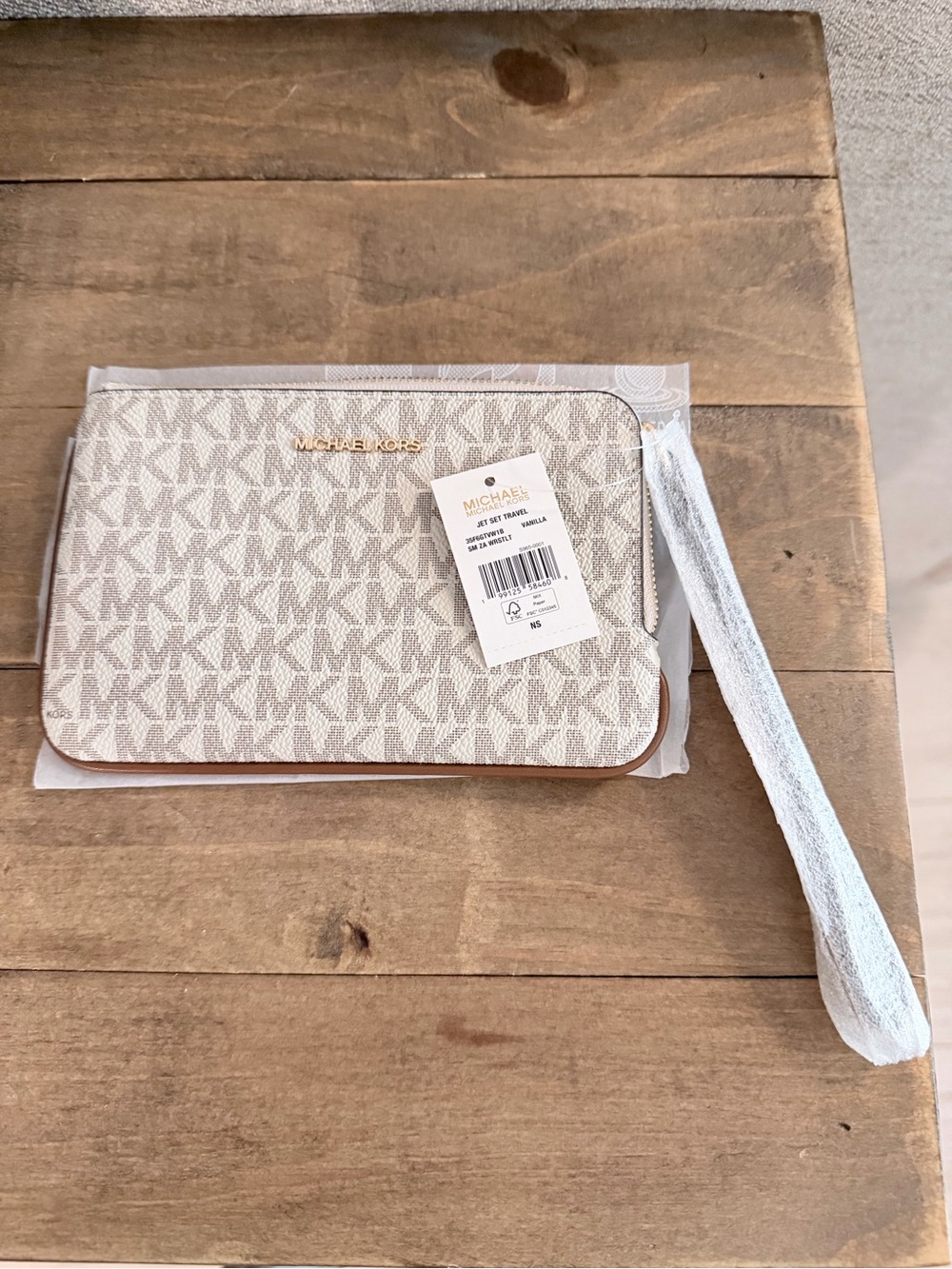 Michael Kors Ivory/Beige MK Logo Zip Wristlet with Gold Hardware